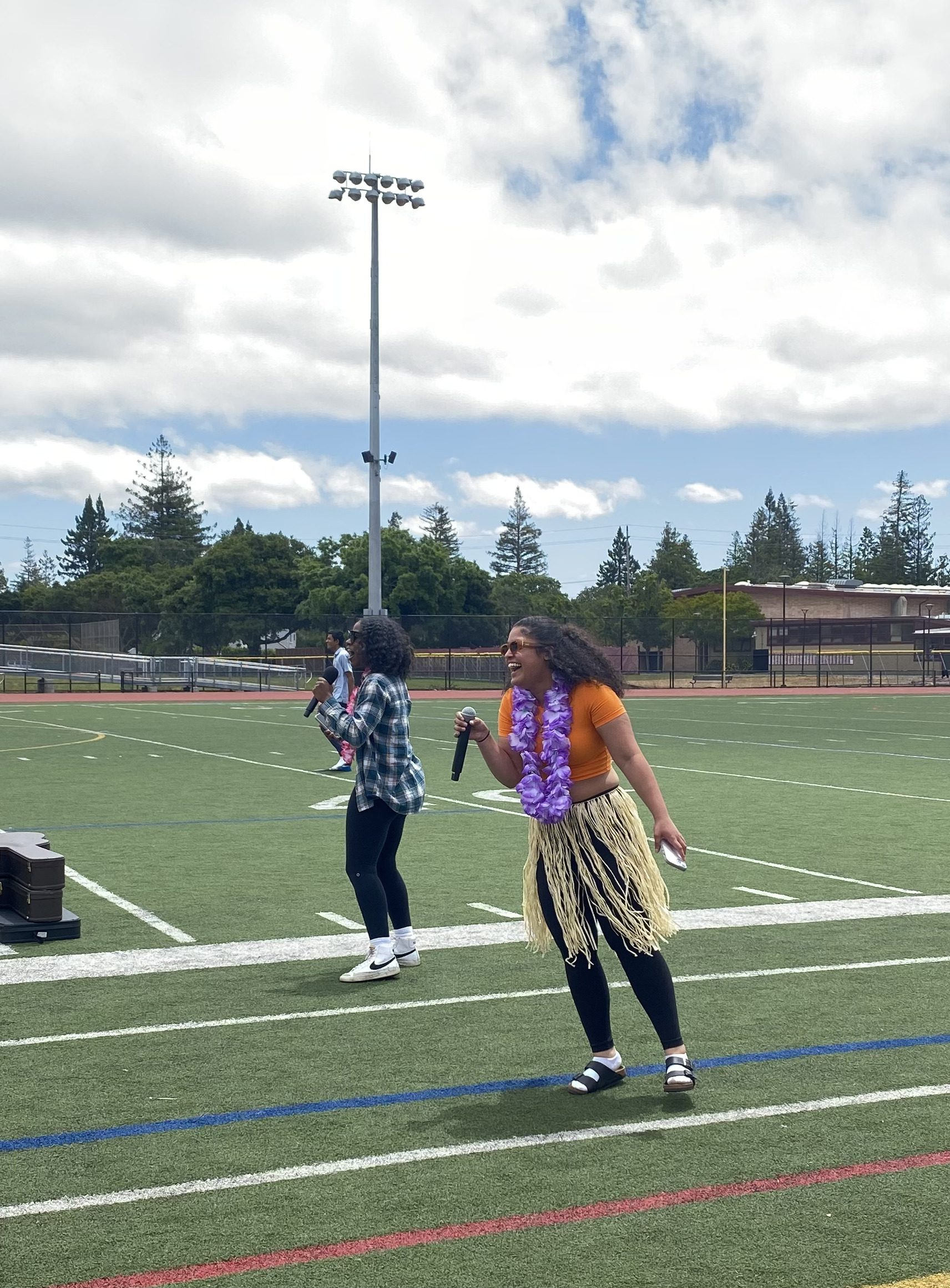 MCs junior Janiya Moss and senior Jasira Johnson comment on the relay race.