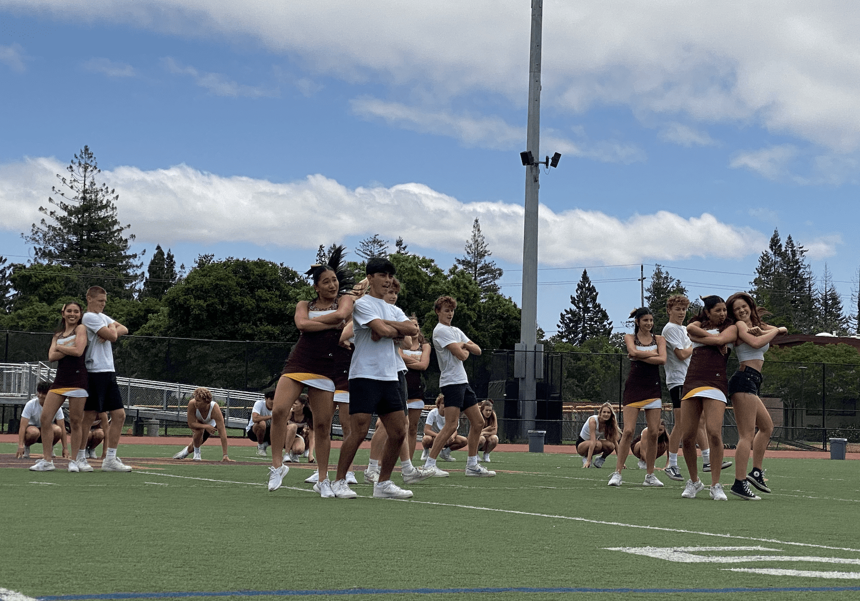 The dance team performs a partner dance routine.