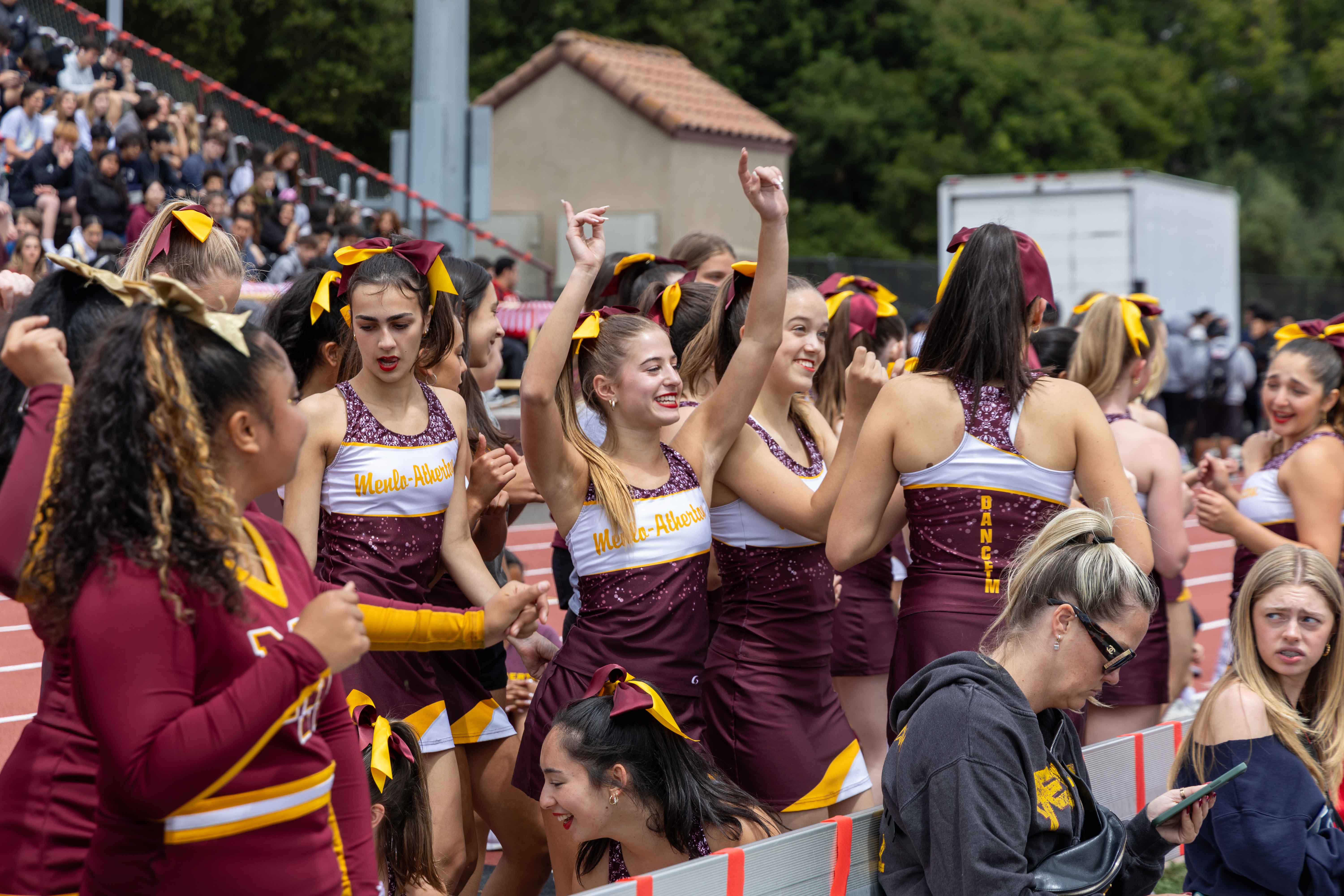 Dance team swings to the music before the rally.