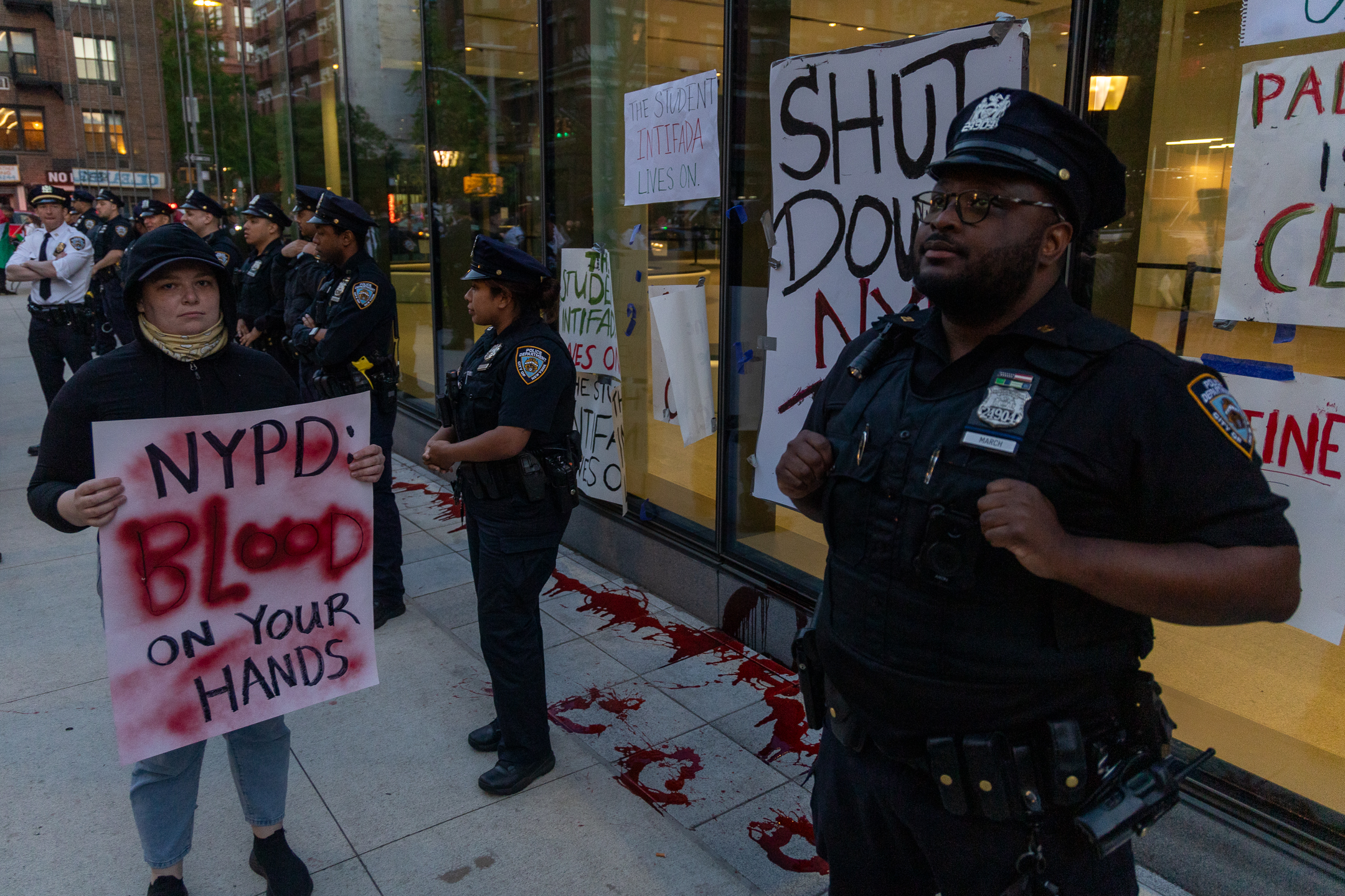NYPD stand guard outside protests at NYU. Photo courtesy of Krish Dev.