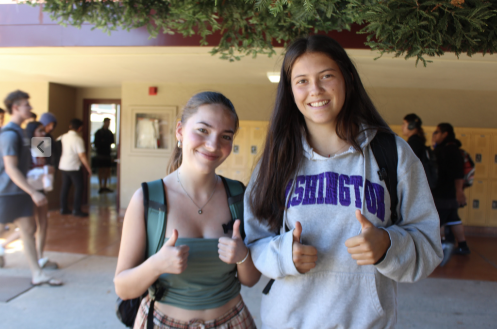 Kunihiro (right) and junior Tatiana Schrader.