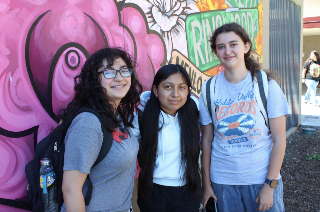 Juarez (center) with freshmen Delilah Bellis (left) and Isidora Chicurel (right).