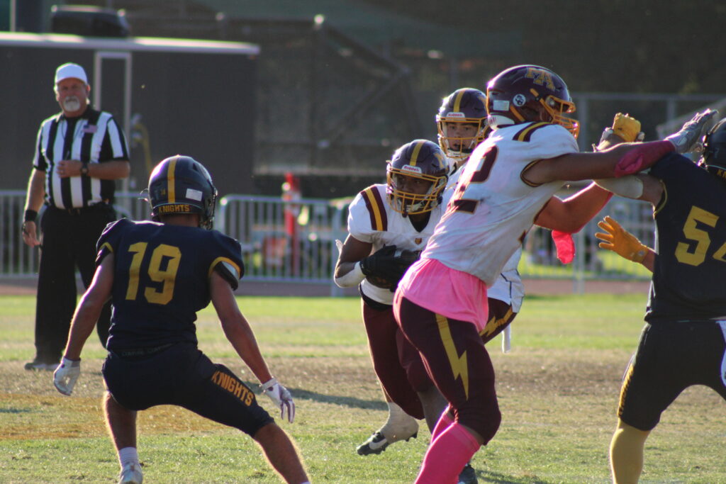 Junior running back Monty Turner running the ball.